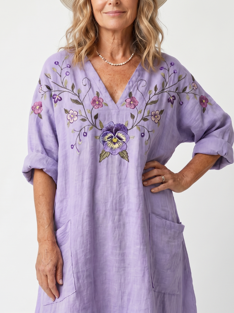 Tavi | Vestido midi oversized floral com bolsos