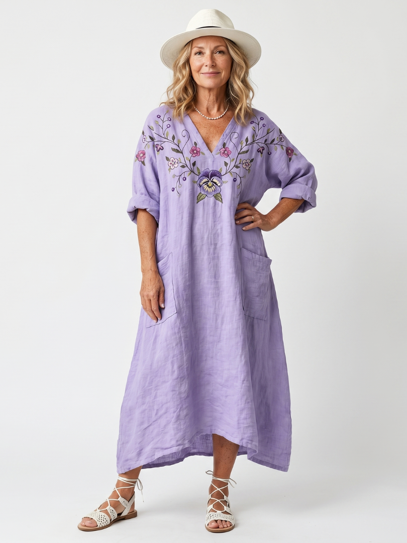 Tavi | Vestido midi oversized floral com bolsos