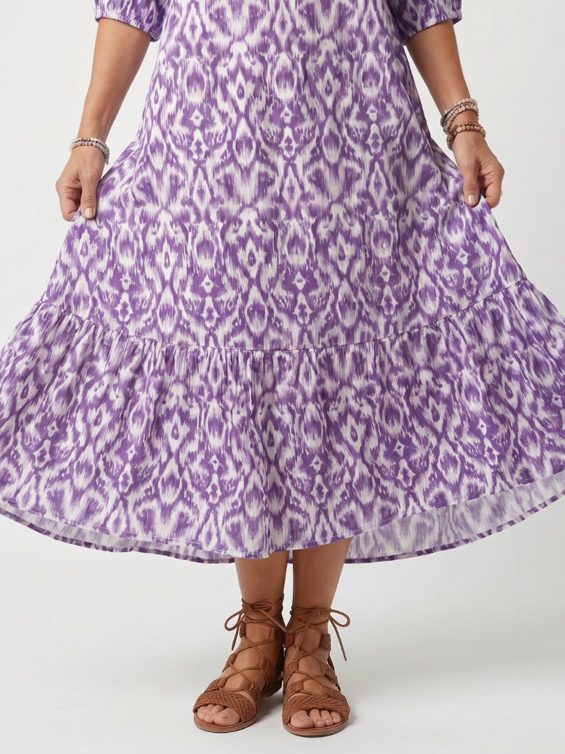 Penelope | Vestido midi estampado com cordões com borlas