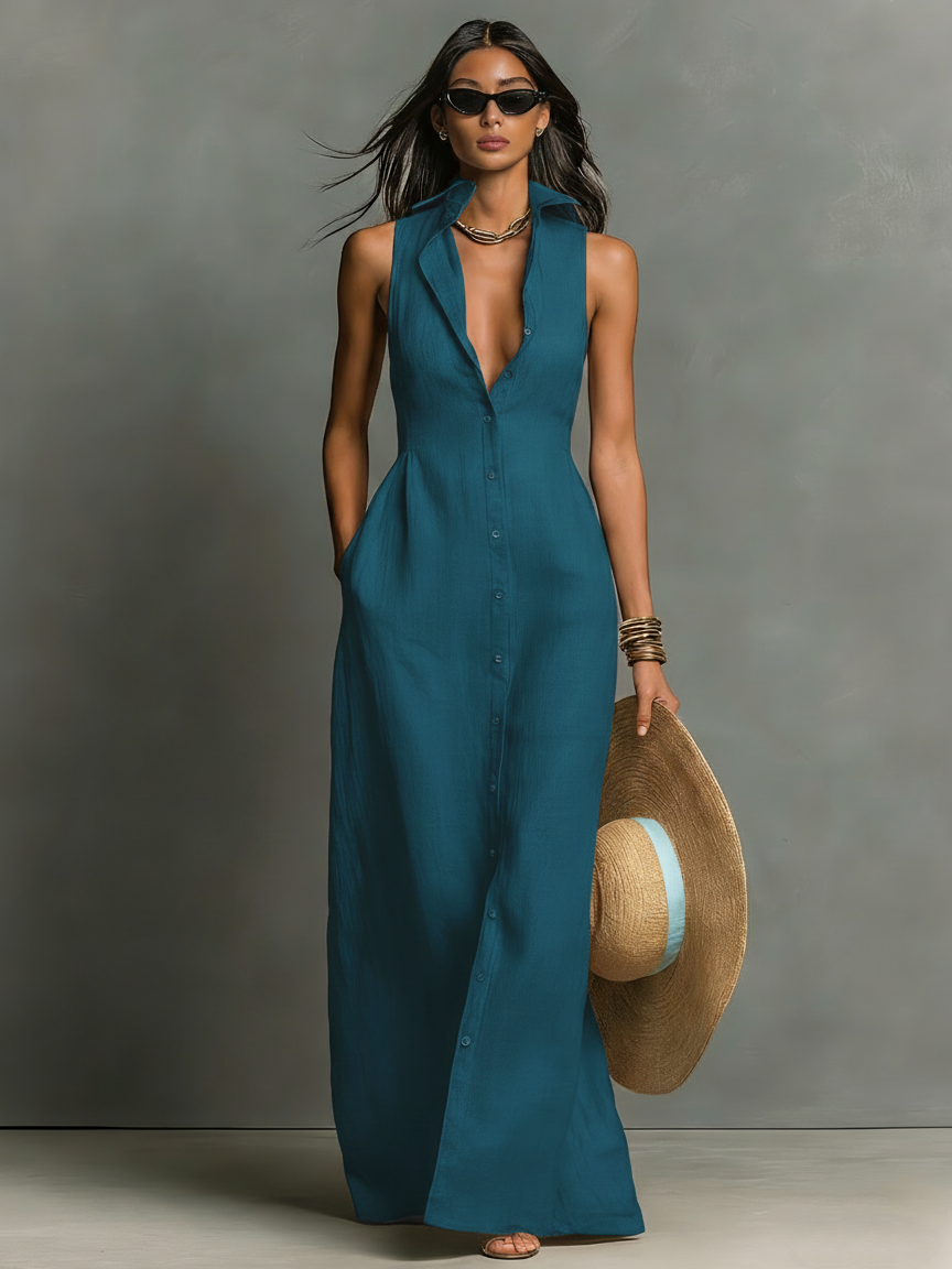 Vestido-camisa maxi minimalista, de uma só fila de botões, sem mangas e com colarinho